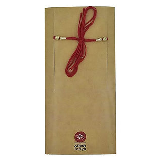 Raksha Bandhan Combo Pack for Brother-Ganesha Design Rakhi with Greeting Card & Roli Chawal(Ganesh on Lotus-Roli Chawal-06)